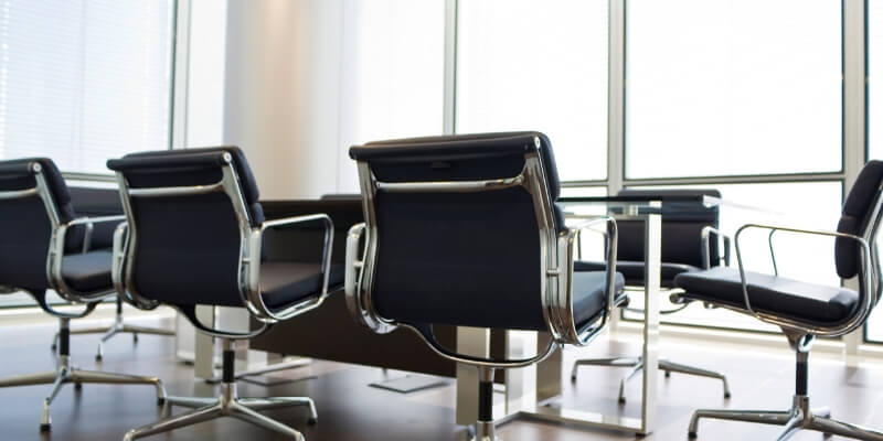 chairs at at desk in a office.