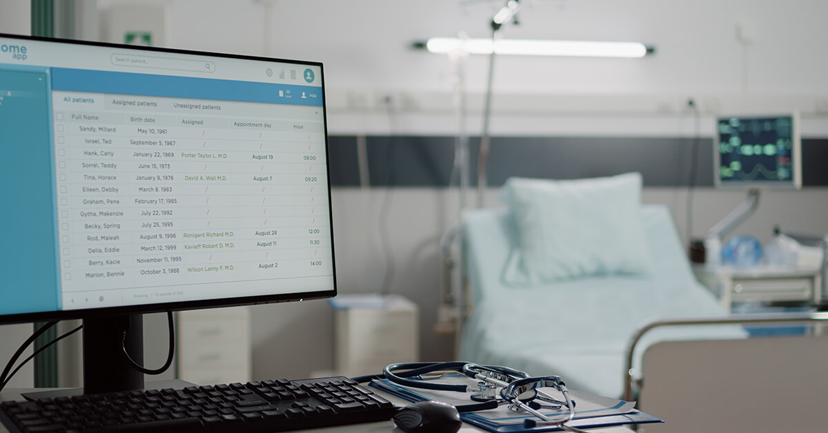 Hospital workstation displaying electronic patient records in a modern clinical environment.