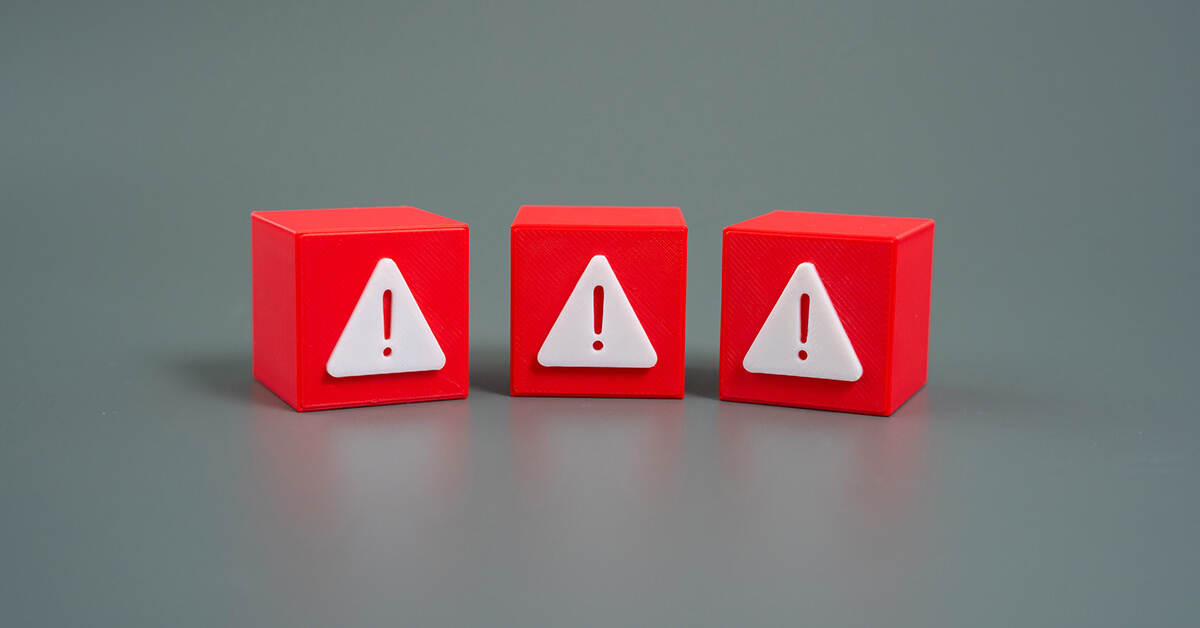 Three red warning symbols representing potential risks and red flags.