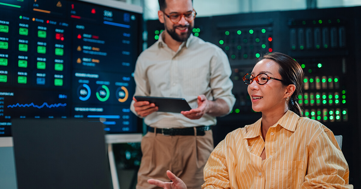 IT professionals monitoring systems and infrastructure as part of ongoing technology management and support.